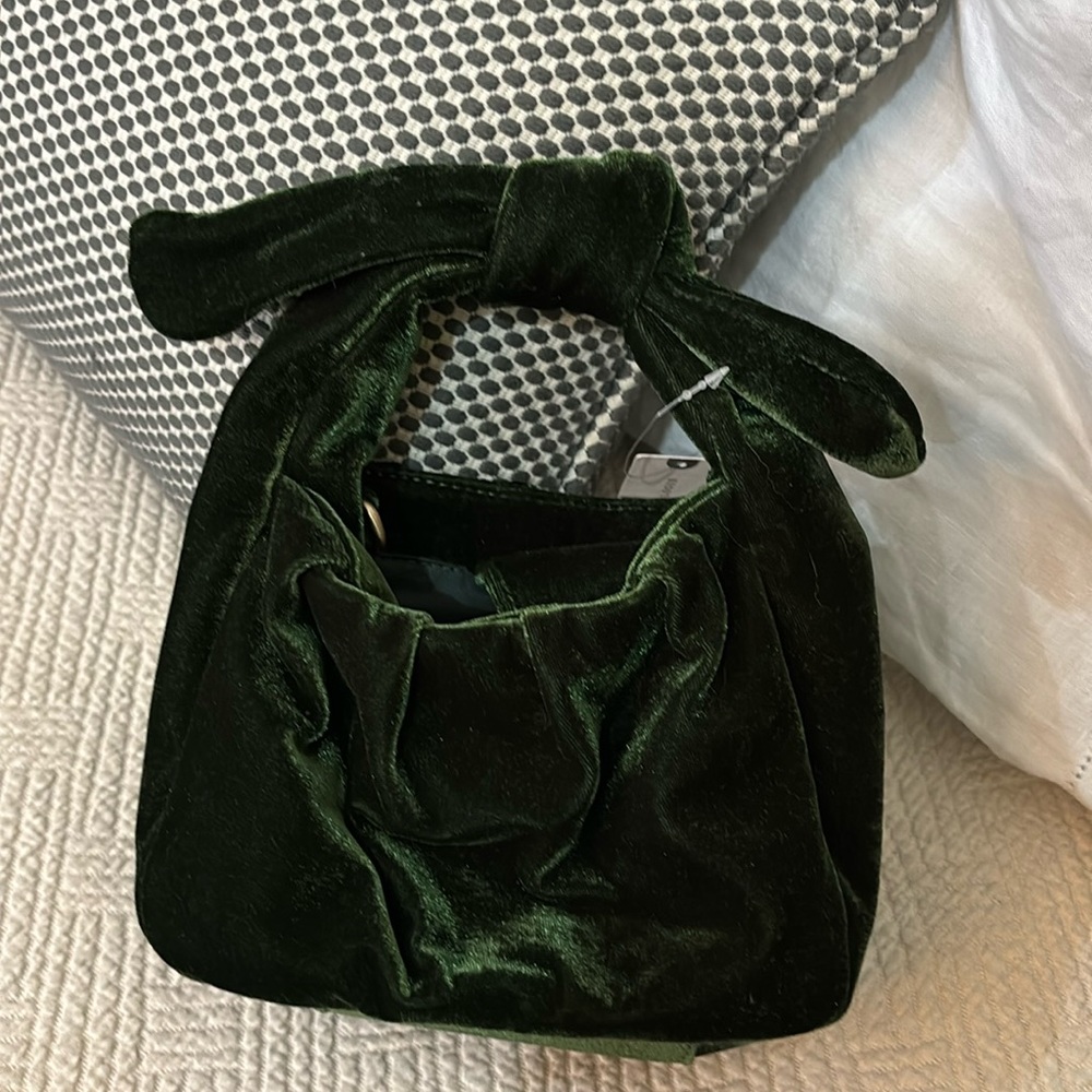 Dark green velvet purse with cross body shoulder strap from Anthropologie